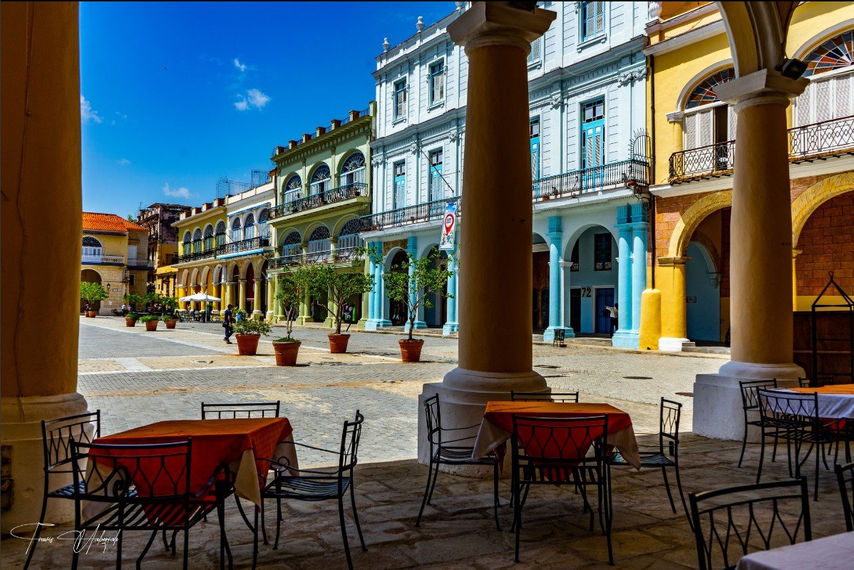 Colorful colonial buildings in Old Havana plaza